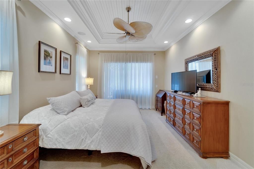 Amazing recessed lighting, double tray ceiling with luxury wood accents.