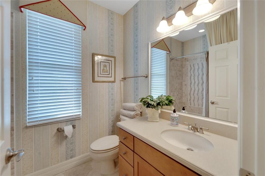 Bathroom 4, yes 4 bathrooms total.  This home is perfect for that large family or multi-generational.  Everyone will have their space and the best part is this is a true "SPLIT PLAN" for privacy.