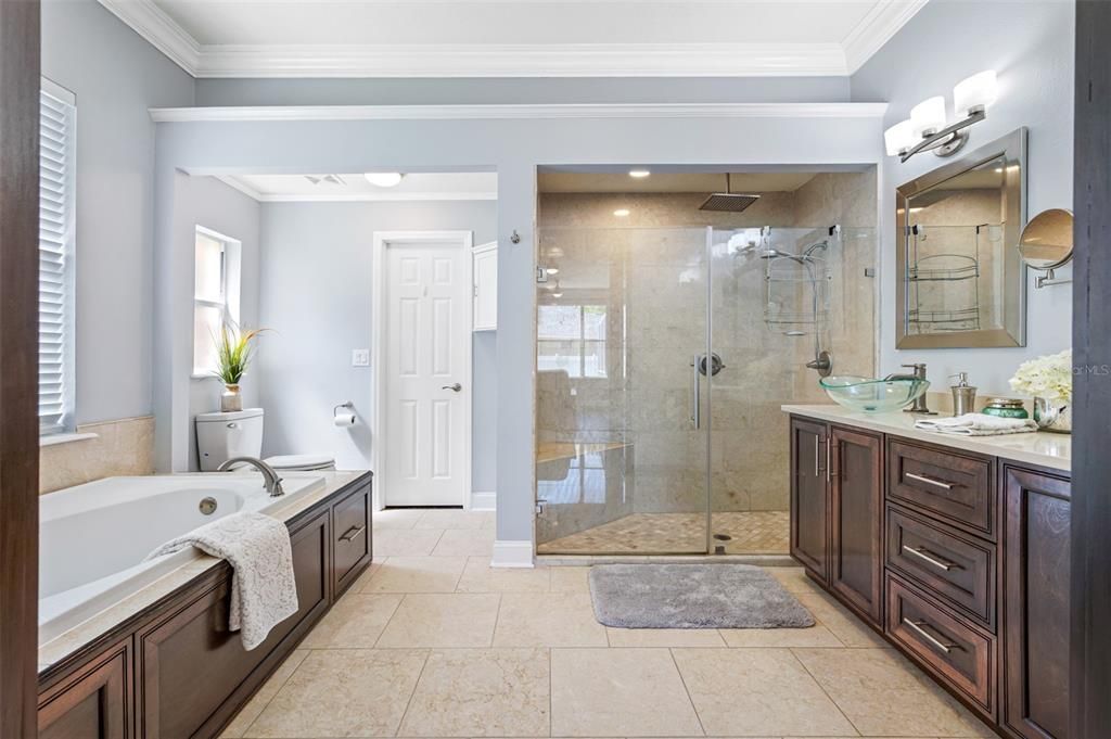 Main Bathroom w/walk-in shower, separate tub and dual vanities