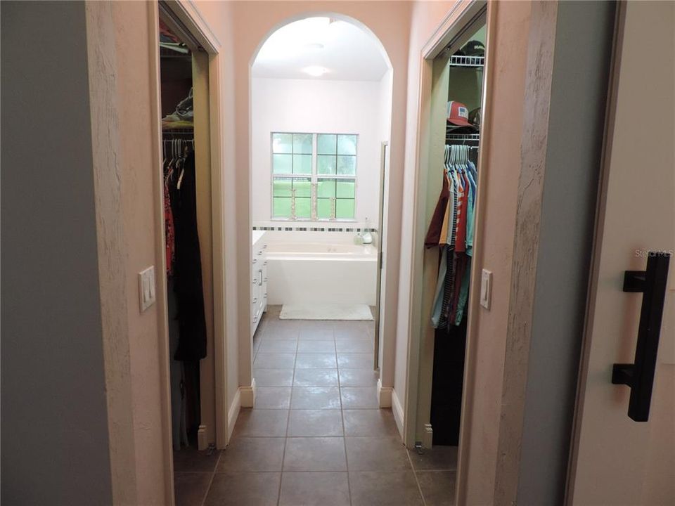 Hall with closets to master bath