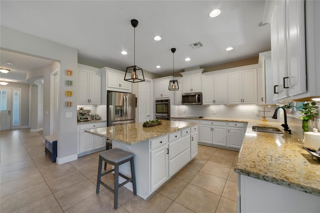 Follow the natural flow into the must see kitchen, casual dining and living room!