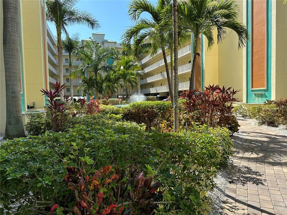 Beautiful courtyard walkways to beach and pools