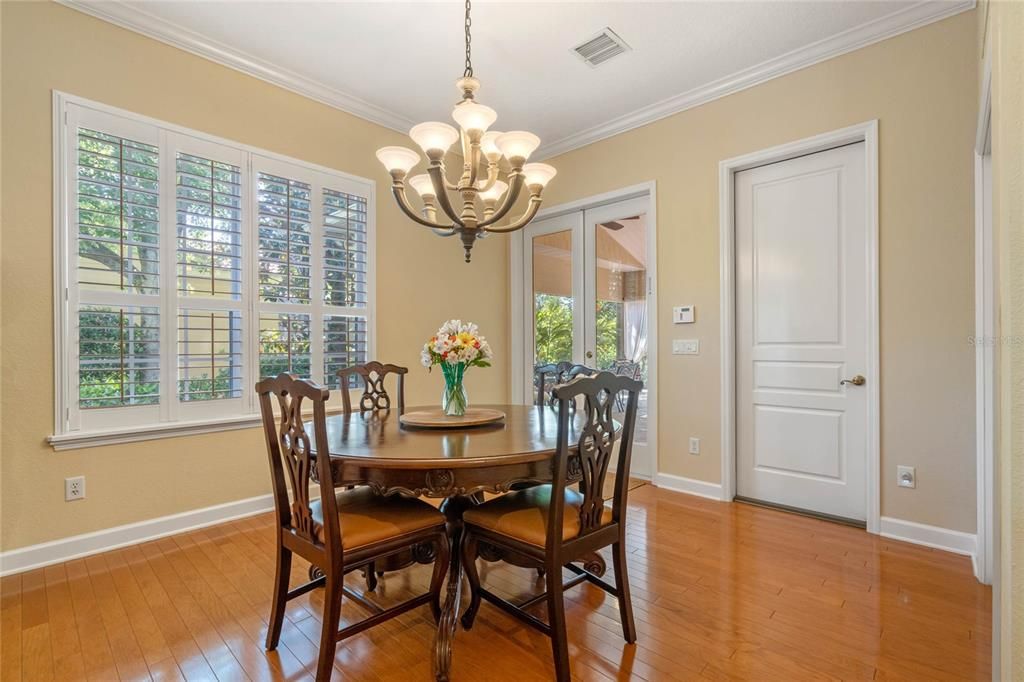 Dining room featuring french doors leading to the covered patio