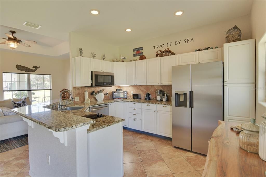 Well Appointed Kitchen with New Appliances and Granite Counters