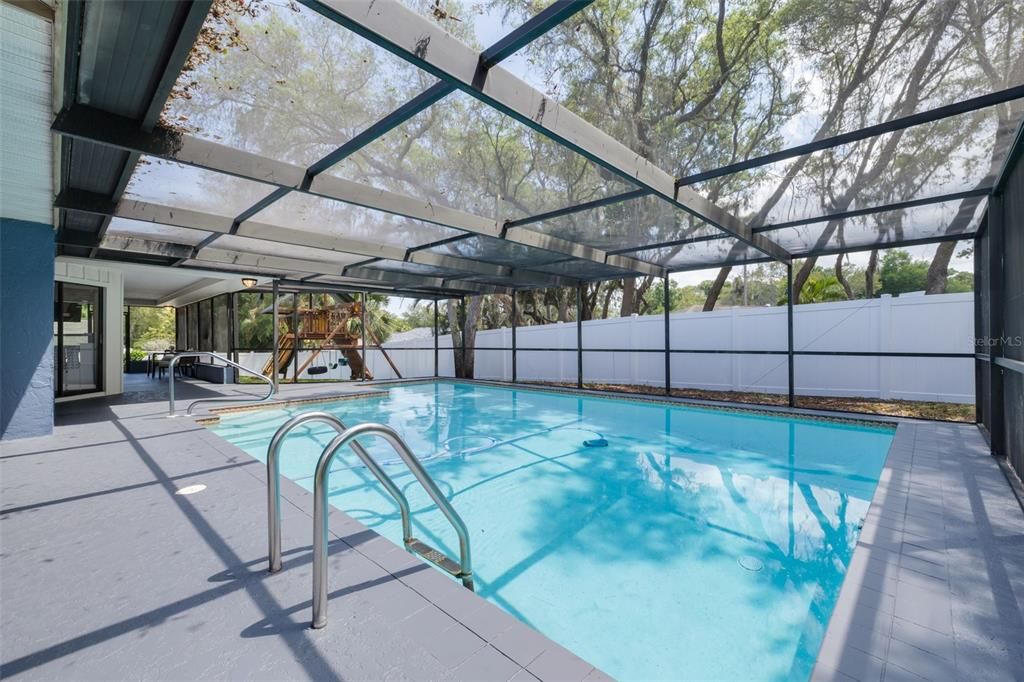 Enjoy Florida living in the screened-in pool area