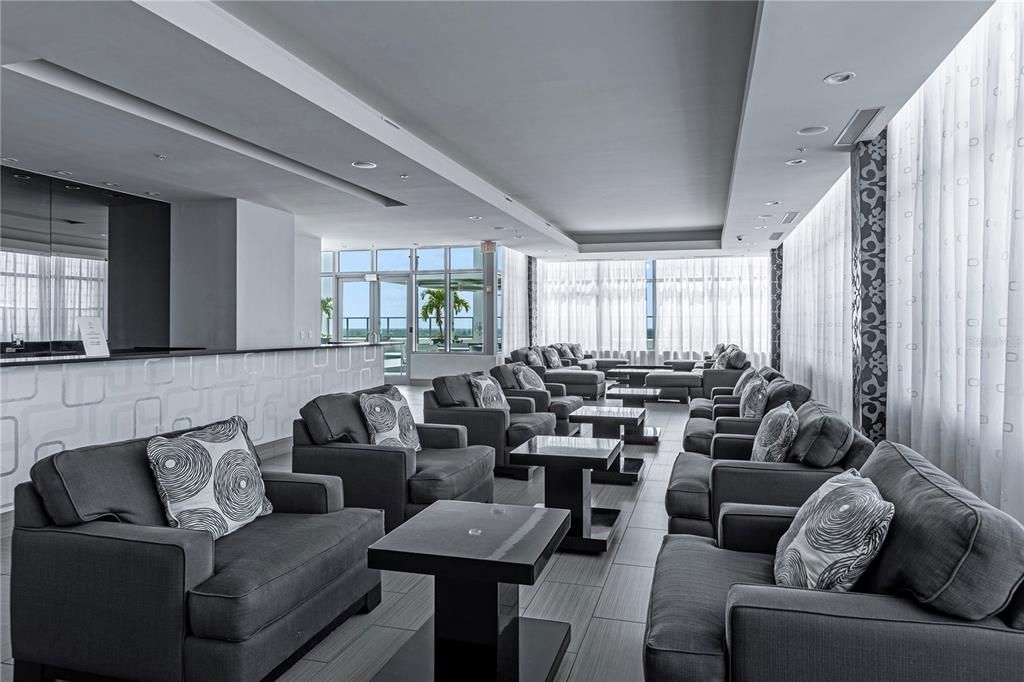 SKY club lounge. Kitchen (left) used for events/gatherings. Board meetings also held here.