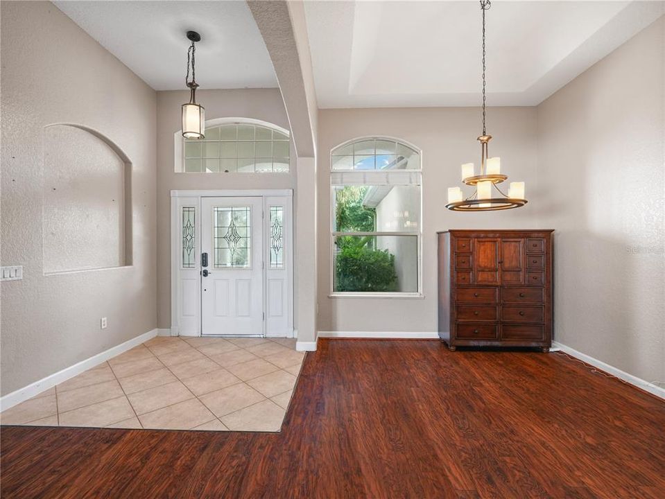 Double foyer with formal dining room
