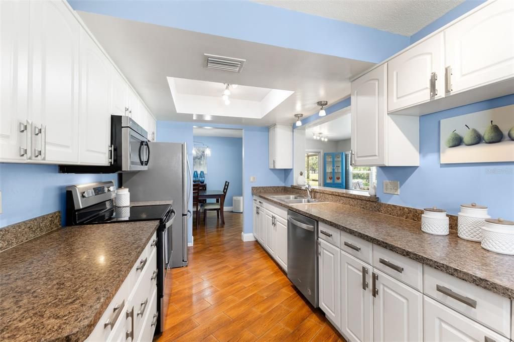 Nice galley kitchen with stainless steel appliances