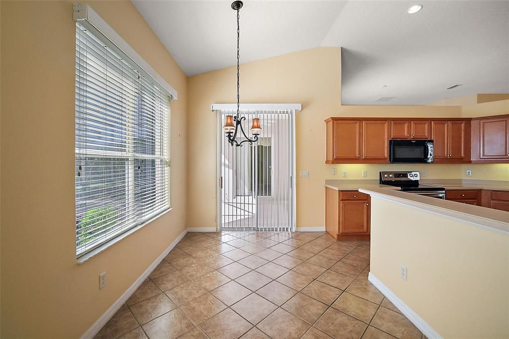 Eating space in the kitchen with access to your private lanai