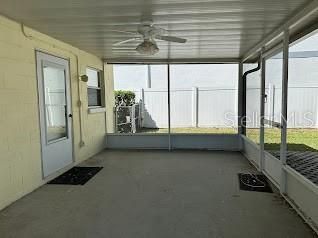 Screened back lanai with ceiling fan
