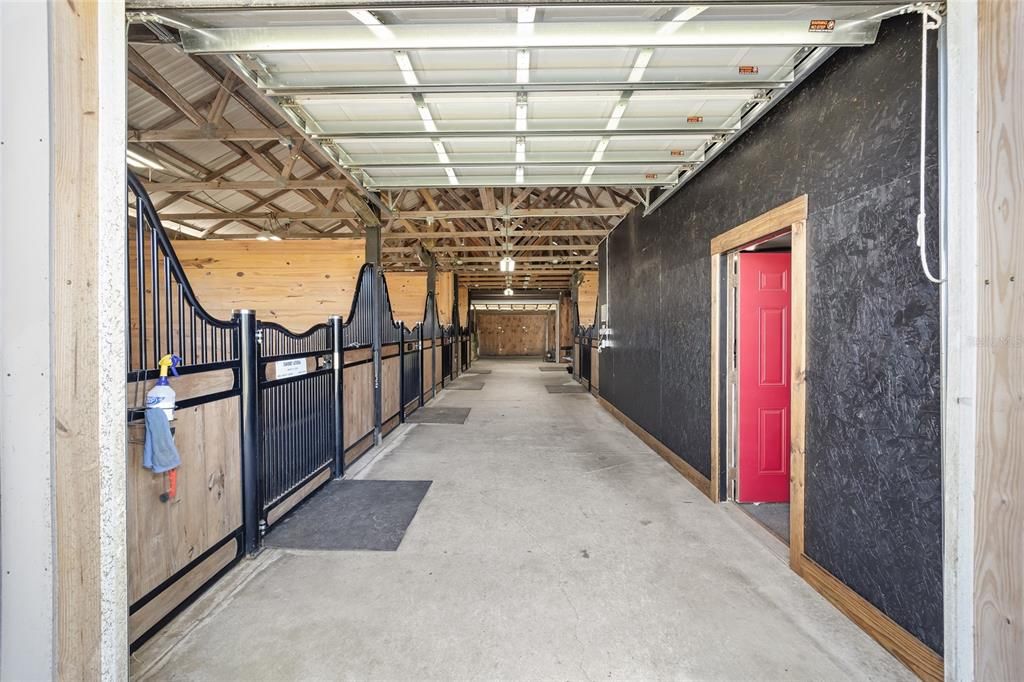 Entry to 5 Stall barn, tack/feed room on right.