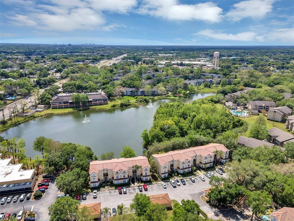 Aerial view of unit- pond with multiple fountains and SR434 in background