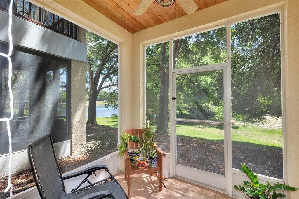 Screened in porch -perfect for relaxing after work overlooking the pond