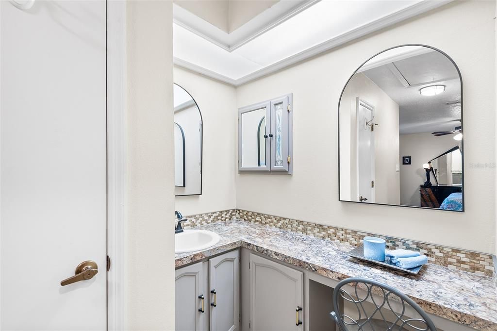 PRIMARY BATH VANITY AND LINEN CLOSET