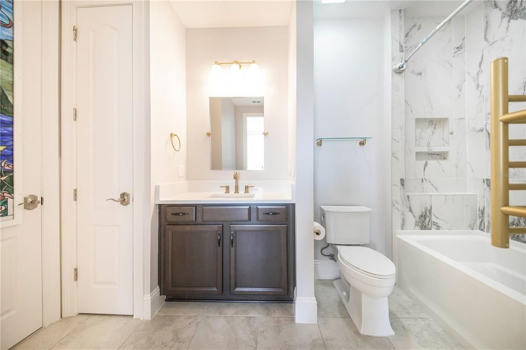 Upstairs Bedroom Ensuite Bathroom with Heated Towel Rack, has Linen Closet and Walk in Closet.