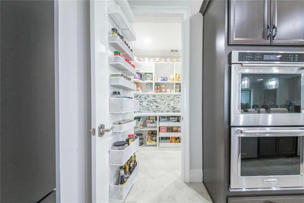 Amazing organized Walk in Dream Pantry with electrical for all your small kitchen appliances