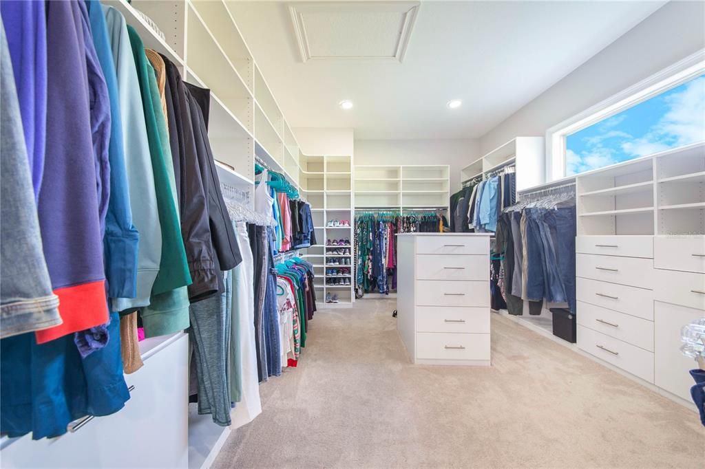 Beyond the Master Bathroom, Huge Master Closet has plenty of storage