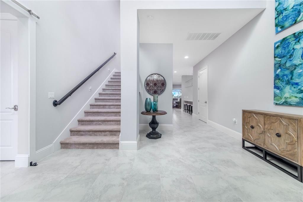 Grand Entry Features Soaring Two Story Ceiling