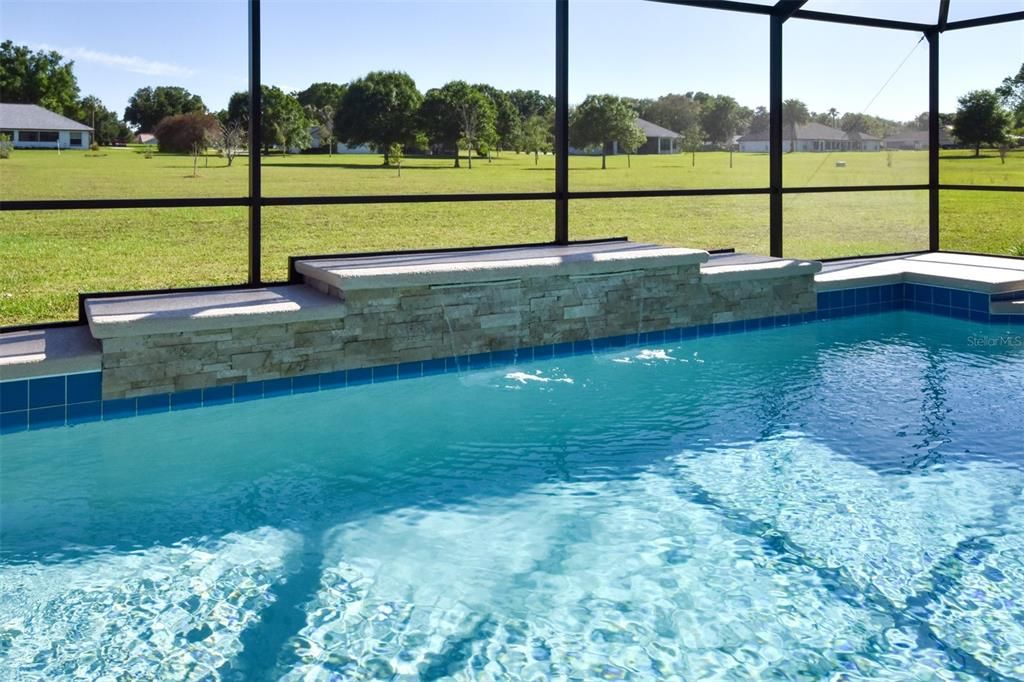 Caged Solar Heated Pool Waterfall