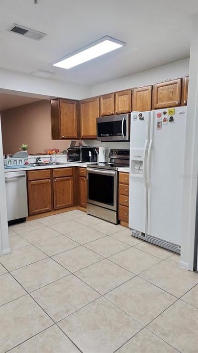 Over Sized Kitchen with Stainless Steel Dishwasher, Stove, & Microwave. Fridge, Washer & Dryer Included.