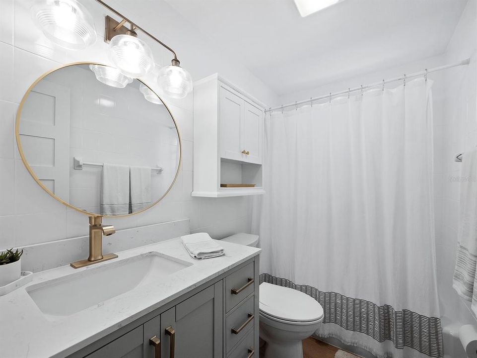 The guest bathroom off the hallway is easily accessible to your guests.