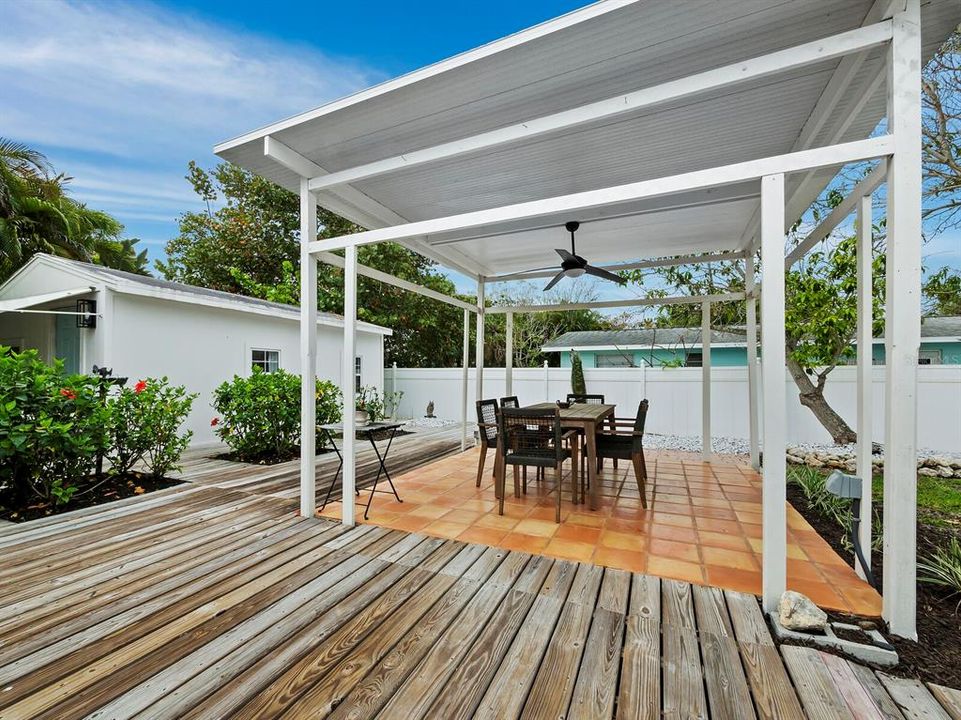 The expansive wood deck connects the casita, dining pavilion, primary suite and front of the home seamlessly.