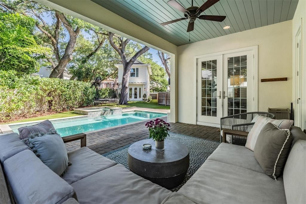 Pool view with guest house