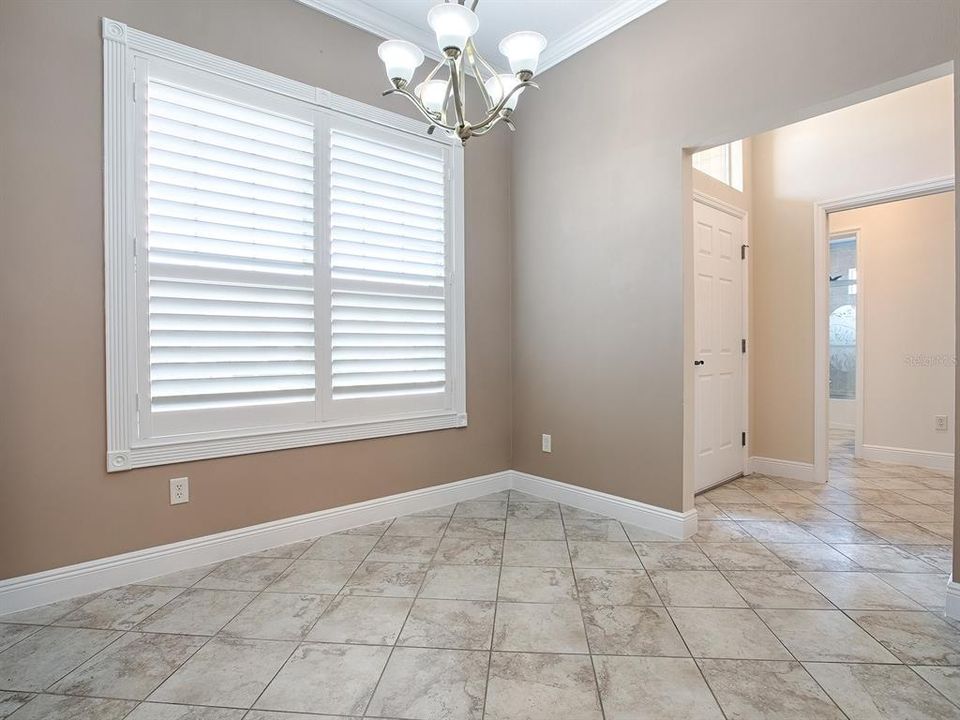 AS YOU WALK INTO THE KITCHEN FROM THE FOYER, YOU'LL FIND THE EAT-IN CASUAL DINING AREA.