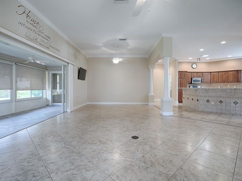OPEN FLOOR PLAN. LOVELY DIAGONAL TILE THROUGHOUT THIS AREA. WALL MOUNTED TV.