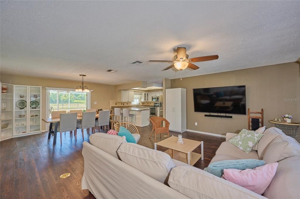 Living area open to the dining and kitchen