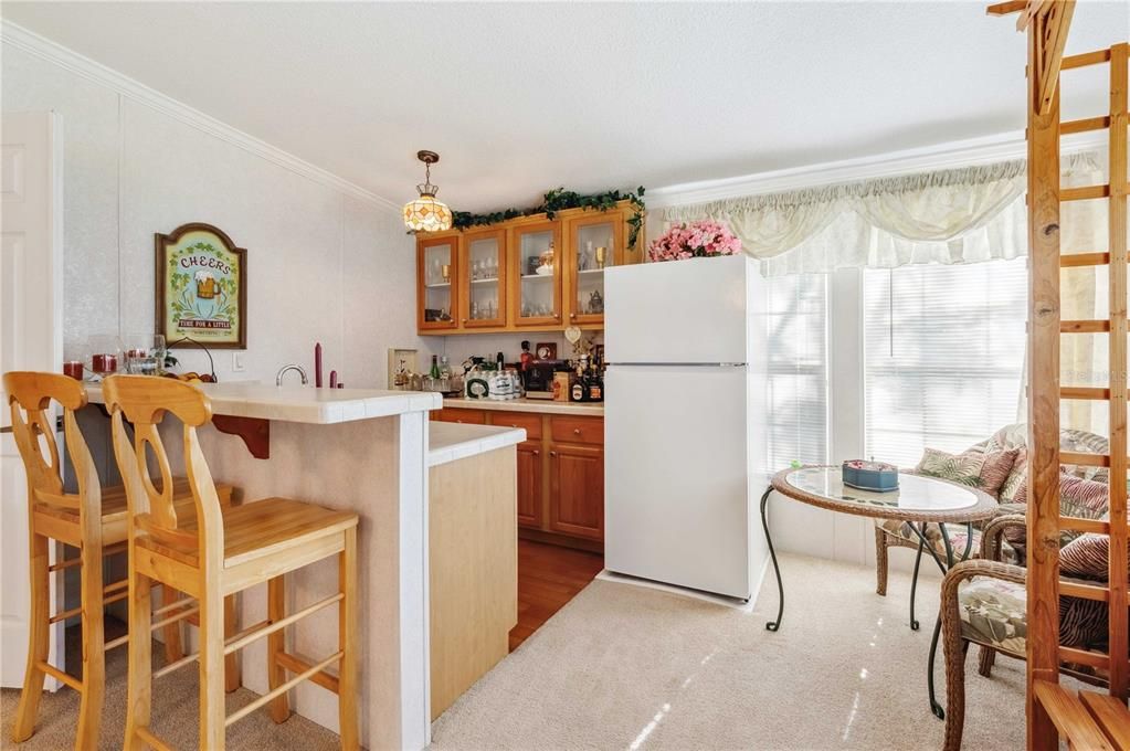 Wet bar area in this family room which is great of entertaining.