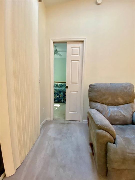 Pocket door to primary bedroom