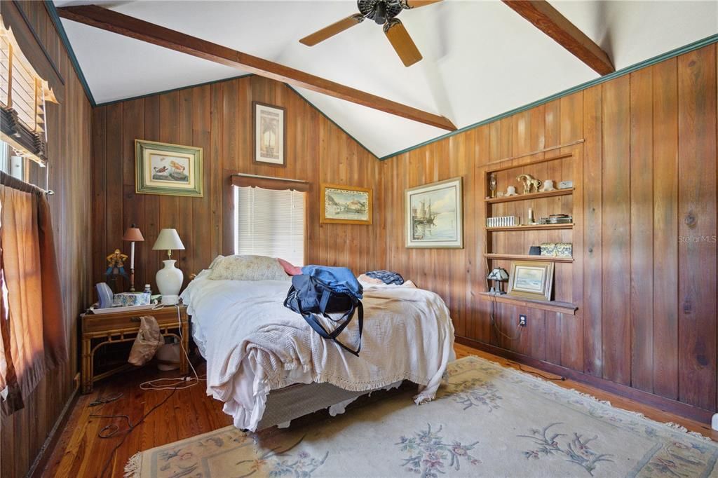 Enjoy the textures and grain patterns that run through this nice size master bedroom...