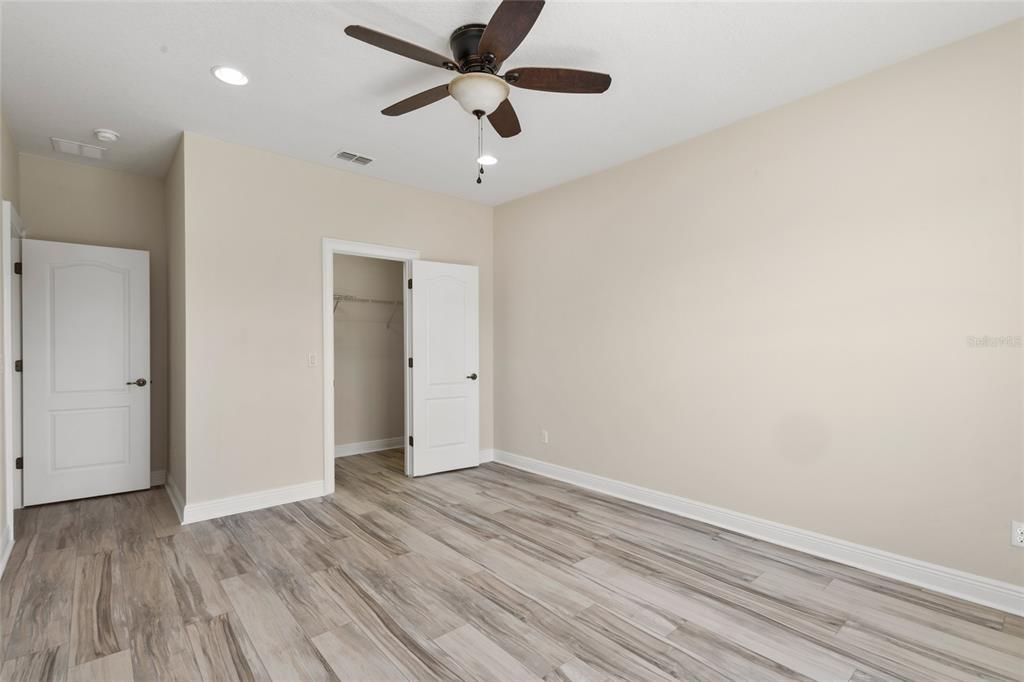 Another view of Bedroom 4 with ceiling fan.