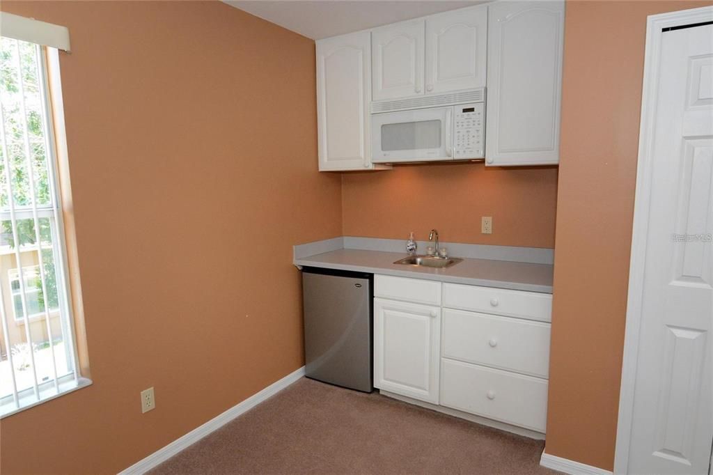 Bonus room comes complete with its own kitchenette!
