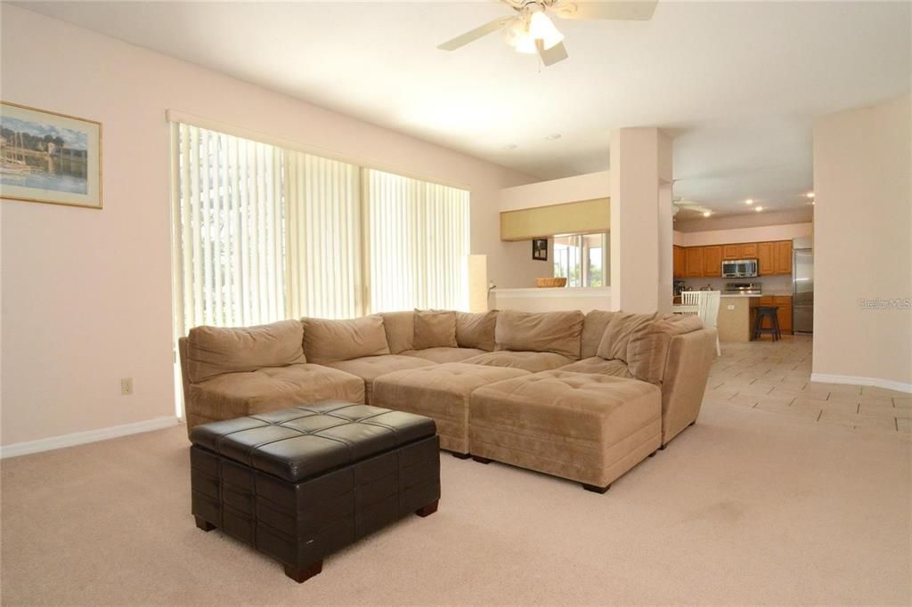 Open and spacious family room/kitchen with plenty of natural lighting. Perfect for entertaining!