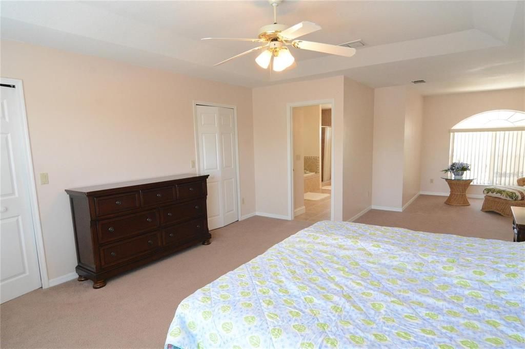Spacious primary suite includes two walk-in closets.