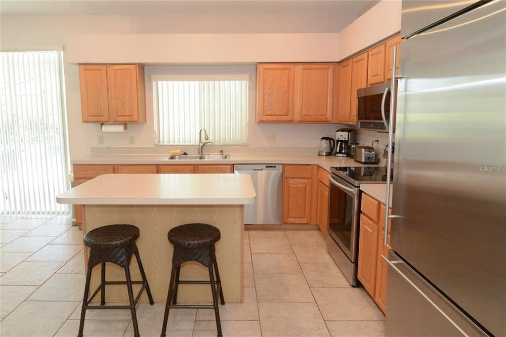 Spacious eat-in kitchen with center island.