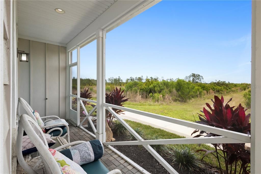 You’ll be welcoming summer in no time as you sit and take in the Florida nature just outside of your screened in patio.