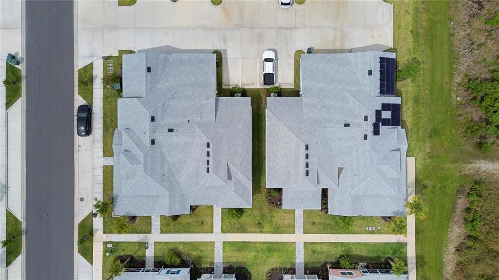 Aerial view. Corner cottage on the right.