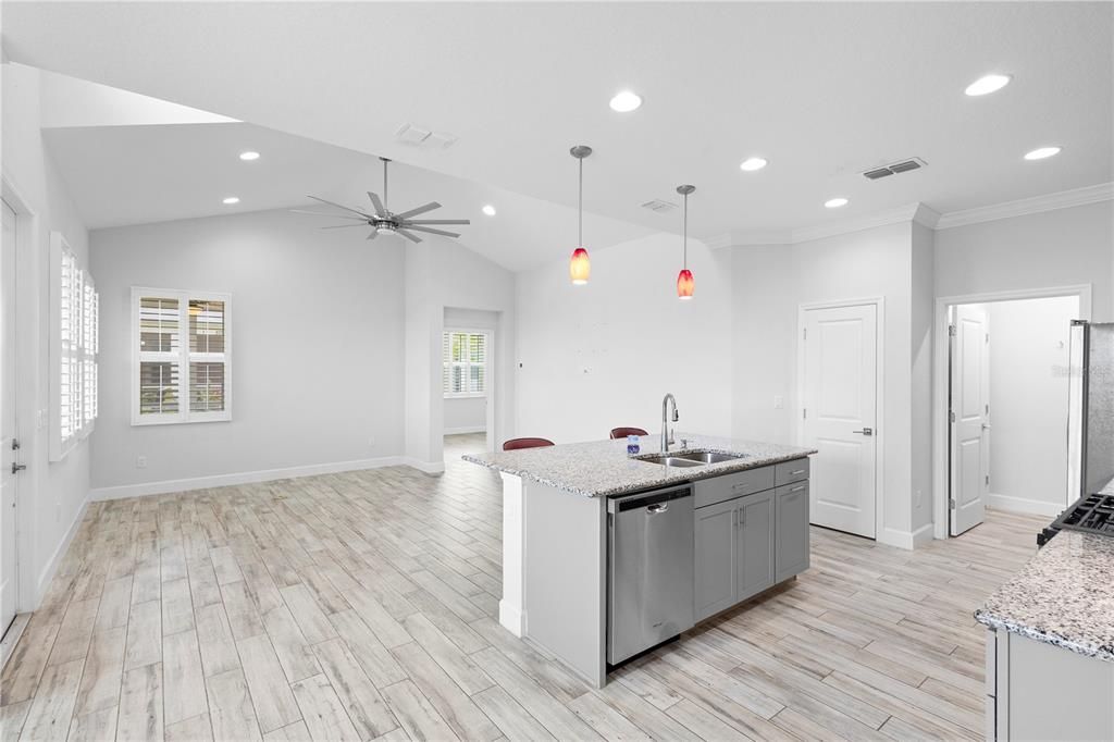 Neutral tones of the luxurious tile floor, plantation shutters, crown molding, and desirable fixtures throughout this 2 bedroom 2 bathroom home.