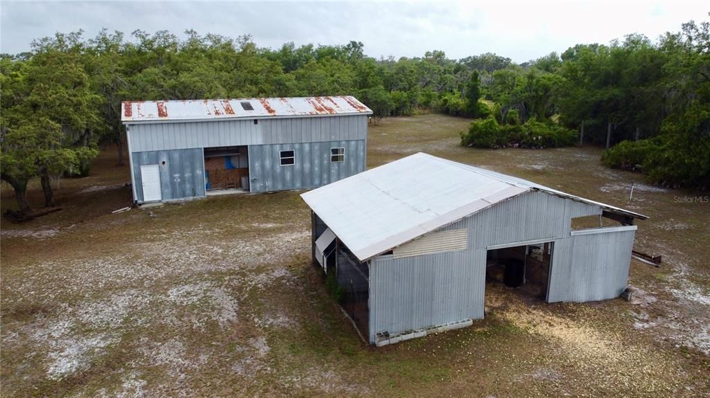 Horse Barn with tack room and additional garage with electrical.