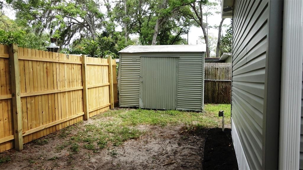 Need extra storage?  Additional shed at the back of property.