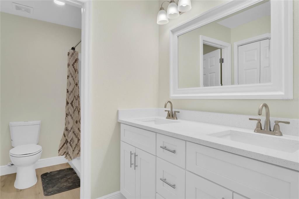 Beautiful master bathroom with quartz countertop, double sinks, large vanity and lots of cabinet space!