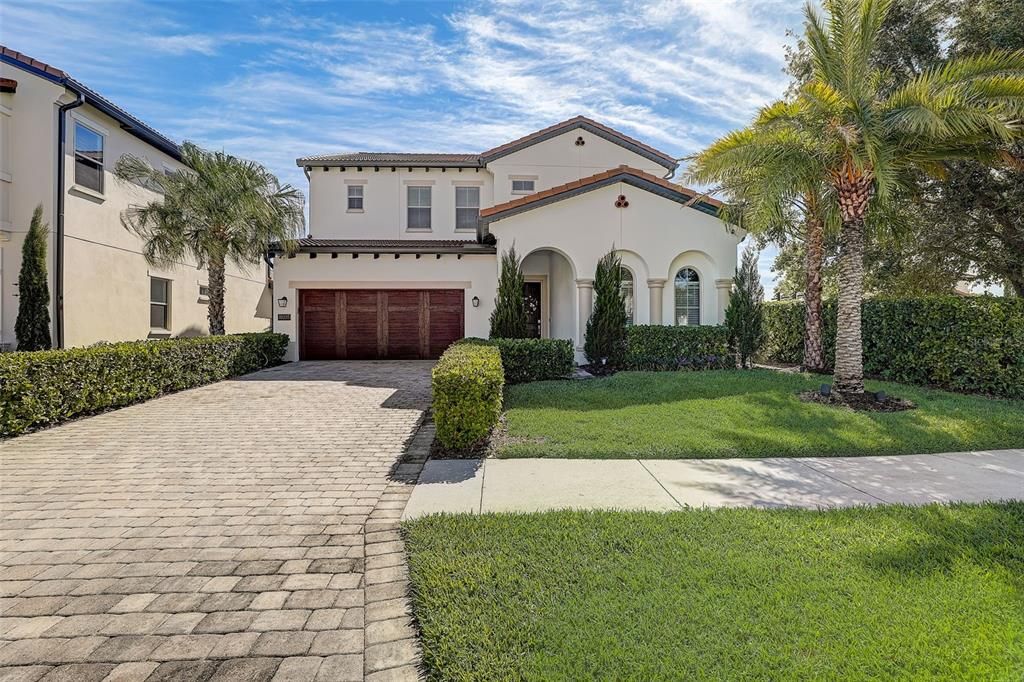 Welcome to Real Life Paradise!! This beautiful Madeira Spanish Colonial Home is Perfectly Located right in the middle of Disney World (less than 1 mile away), Windermere and Dr. Phillips in an UPSCALE 24 HOUR GUARD GATED COMMUNITY WITH a PRIVATE COMMUNITY BOAT RAMP to SOUTH LAKE!! Built by the highly respected Luxury Builder, Toll Brothers, this beauty is LOADED WITH UPGRADES! Boasting 5 BEDROOMS (plus a LOFT), 4.5 BATHS and a 3 CAR TANDEM GARAGE, this isn’t a detail overlooked in this masterpiece!