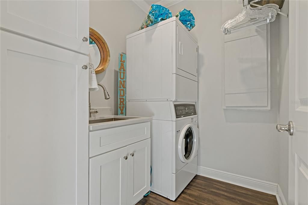CUSTOM BUILT WASHTUB, ADDED STORAGE CABINETS AND QUARTZ COUNTERTOP IN YOUR LAUNDRY ROOM!