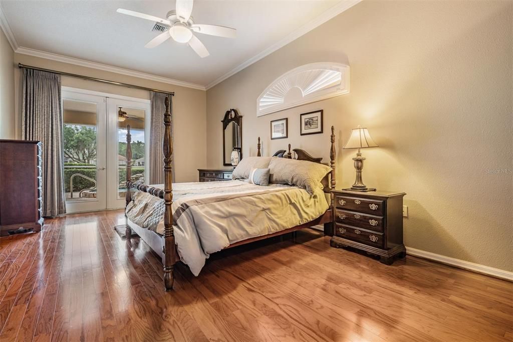 Large primary bedroom with direct access to lanai