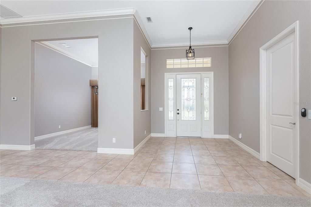 Foyer with new light fixture