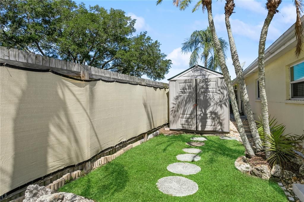 Side yard with storage shed