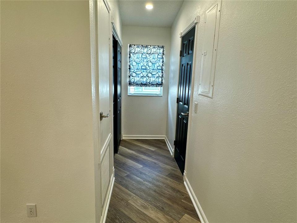 Hallway to Utility Closet and Guest Bath